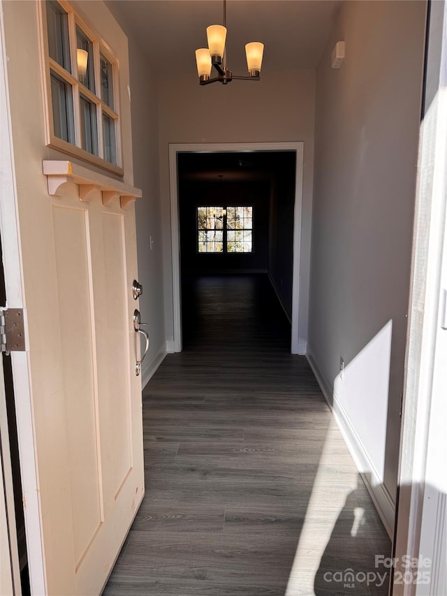 4041 Port Richmond Ave Unit 9, Gastonia, NC 28056 - corridor with dark wood-style floors, a chandelier, and baseboards