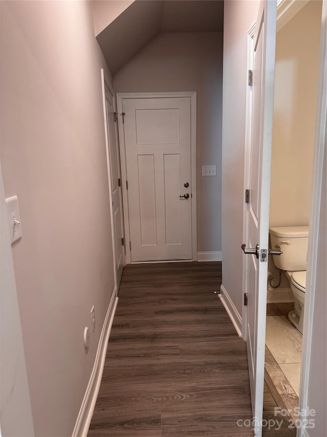 4041 Port Richmond Ave Unit 9, Gastonia, NC 28056 - corridor with dark wood-style floors, baseboards, and vaulted ceiling