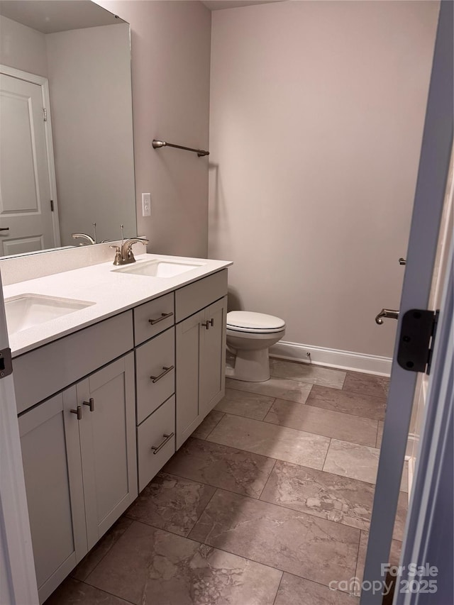 4041 Port Richmond Ave Unit 9, Gastonia, NC 28056 - bathroom with double vanity and toilet