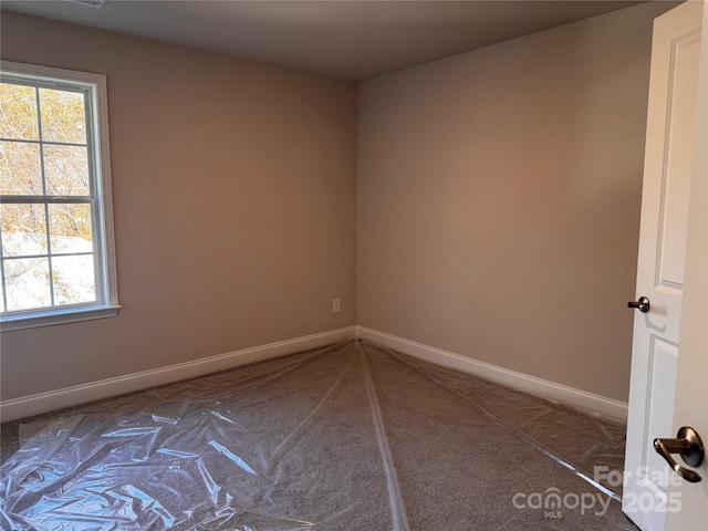 4041 Port Richmond Ave Unit 9, Gastonia, NC 28056 - unfurnished room featuring carpet and baseboards
