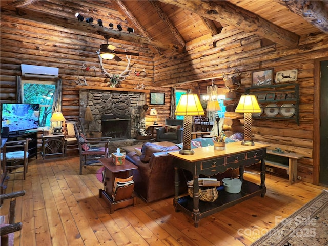615 Sweetwater Rdg, Burnsville, NC 28714 - living area with wood ceiling with exposed beams, log walls, hardwood / wood-style floors, a wall mounted AC, and a fireplace