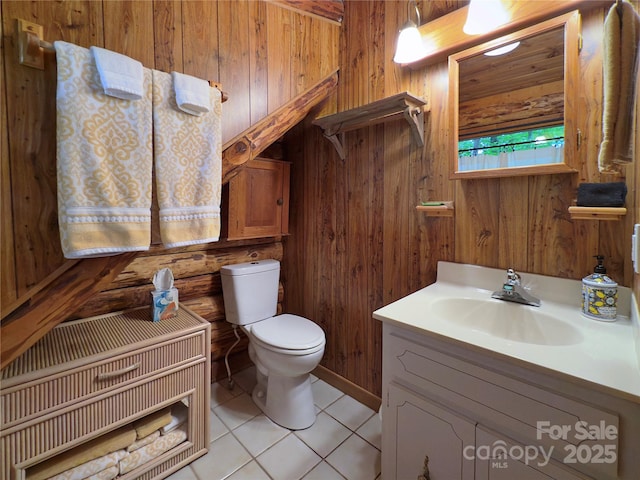 615 Sweetwater Rdg, Burnsville, NC 28714 - bathroom featuring wooden walls, toilet, tile patterned floors, and vanity
