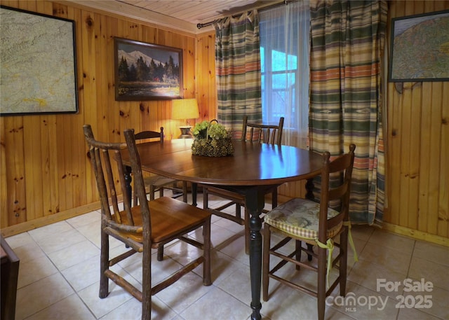615 Sweetwater Rdg, Burnsville, NC 28714 - dining area featuring wooden walls, light tile patterned flooring, baseboards, and wood ceiling