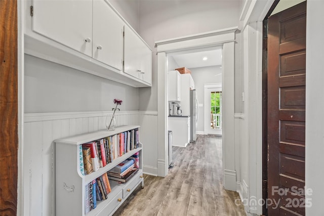 4569 Edgeland Rd, Edgemoor, SC 29712 - hall featuring a wainscoted wall and light wood-style flooring