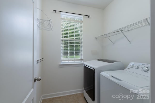 11945 Red Rust Ln, Charlotte, NC 28277 - laundry area featuring separate washer and dryer and light tile patterned floors