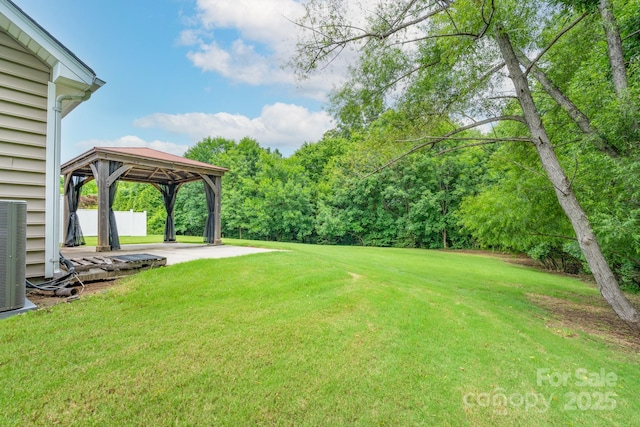 11945 Red Rust Ln, Charlotte, NC 28277 - view of green lawn featuring a gazebo, a patio area, and a carport