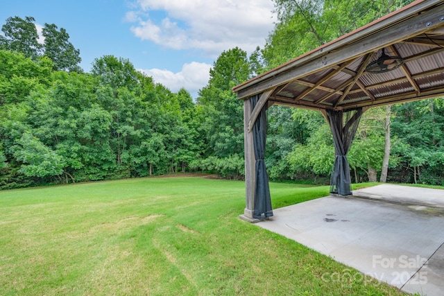 11945 Red Rust Ln, Charlotte, NC 28277 - view of grassy yard with a patio, a gazebo, and view of scattered trees