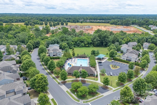 11945 Red Rust Ln, Charlotte, NC 28277 - aerial view of residential area with a pool area and a forest