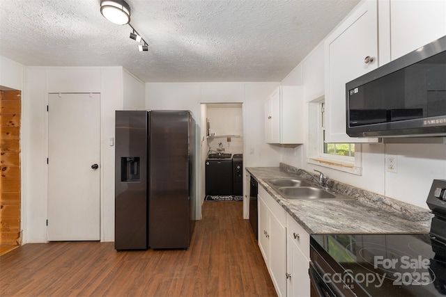 116 Hidden Meadow Dr Unit 17, Candler, NC 28715 - kitchen with black appliances, a sink, dark wood-type flooring, separate washer and dryer, and white cabinets
