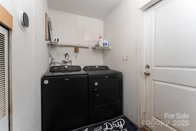 116 Hidden Meadow Dr Unit 17, Candler, NC 28715 - laundry area featuring washing machine and dryer and a textured ceiling