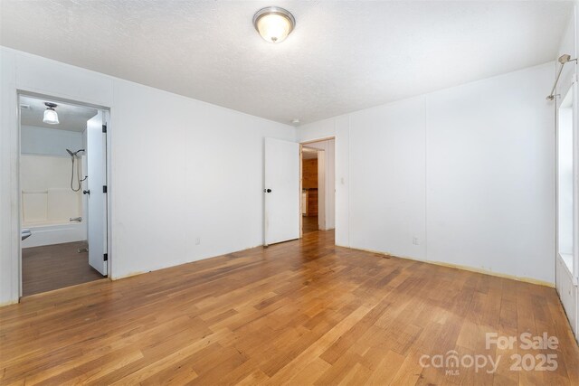 116 Hidden Meadow Dr Unit 17, Candler, NC 28715 - unfurnished bedroom with light wood-style flooring