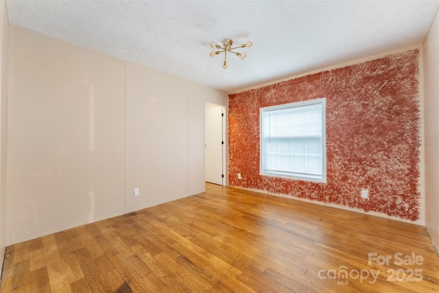 116 Hidden Meadow Dr Unit 17, Candler, NC 28715 - unfurnished room featuring wood finished floors