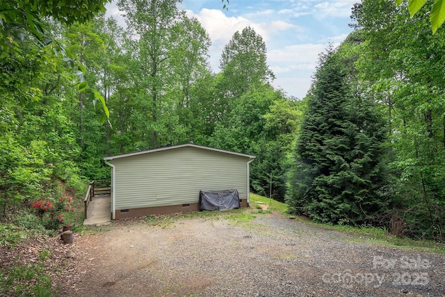 116 Hidden Meadow Dr Unit 17, Candler, NC 28715 - view of outdoor structure with a forest view