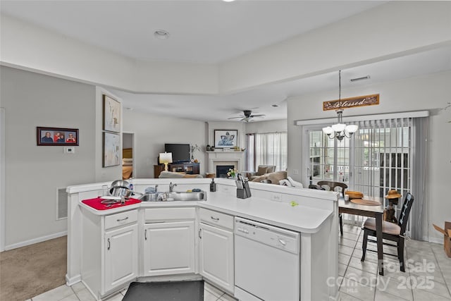 8410 Darcy Hopkins Dr, Charlotte, NC 28277 - kitchen featuring dishwasher, a sink, open floor plan, a fireplace, and light tile patterned floors