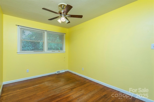 49 Jeffress Ave, Asheville, NC 28803 - empty room with dark wood-style floors and a ceiling fan