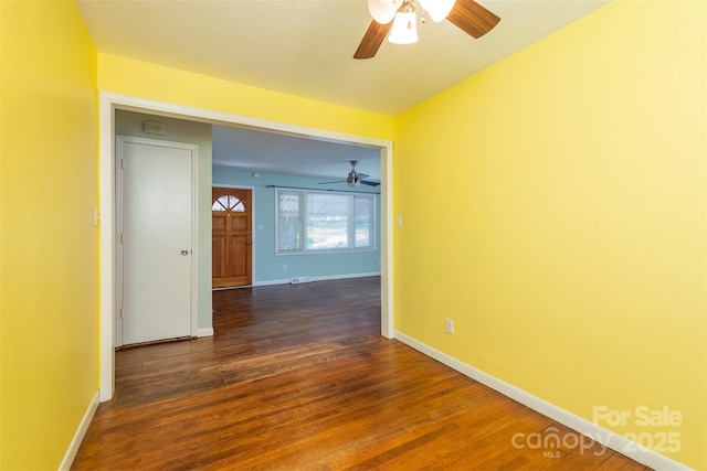 49 Jeffress Ave, Asheville, NC 28803 - empty room with a ceiling fan and dark wood-style flooring