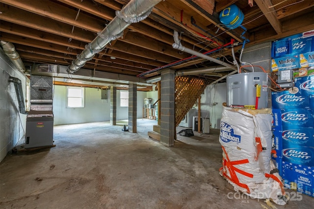 49 Jeffress Ave, Asheville, NC 28803 - basement featuring electric water heater and electric panel