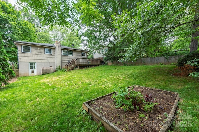 49 Jeffress Ave, Asheville, NC 28803 - view of yard with a vegetable garden, a deck, and stairs