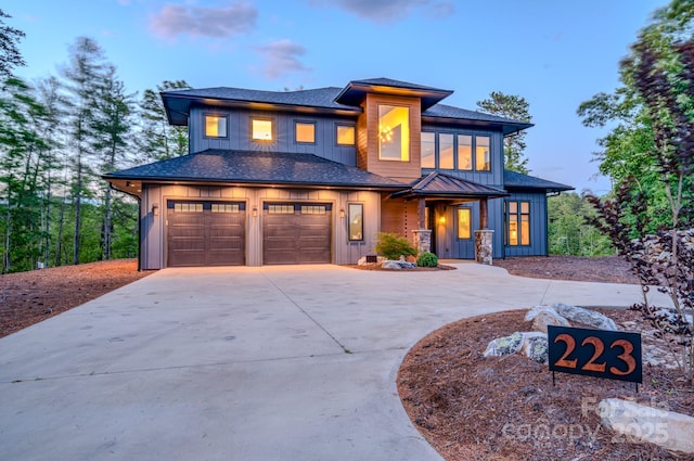 223 Linville View Dr, Nebo, NC 28761 - prairie-style home with curved driveway, board and batten siding, and a standing seam roof