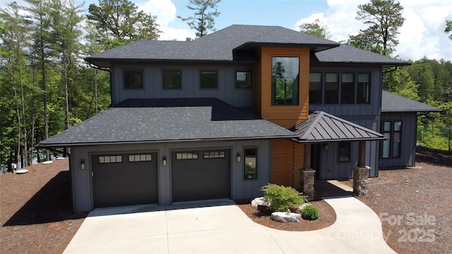 223 Linville View Dr, Nebo, NC 28761 - view of front of property featuring roof with shingles, concrete driveway, board and batten siding, and a garage