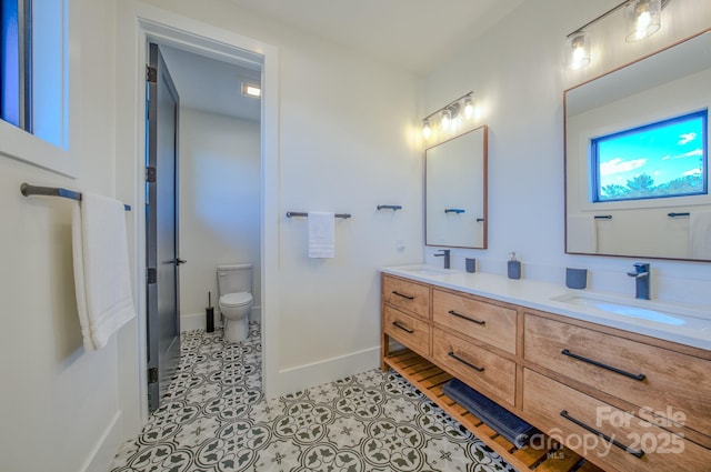 223 Linville View Dr, Nebo, NC 28761 - bathroom featuring double vanity, baseboards, toilet, and tile patterned floors