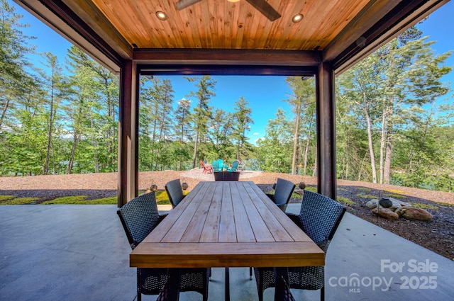 223 Linville View Dr, Nebo, NC 28761 - view of patio / terrace with outdoor dining space and view of wooded area