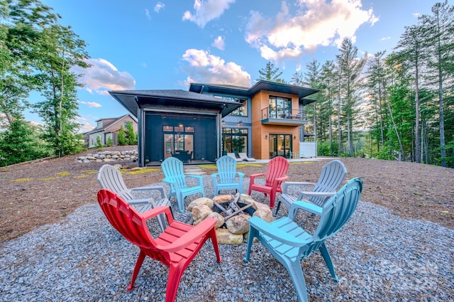 223 Linville View Dr, Nebo, NC 28761 - back of house featuring french doors, a balcony, and a fire pit
