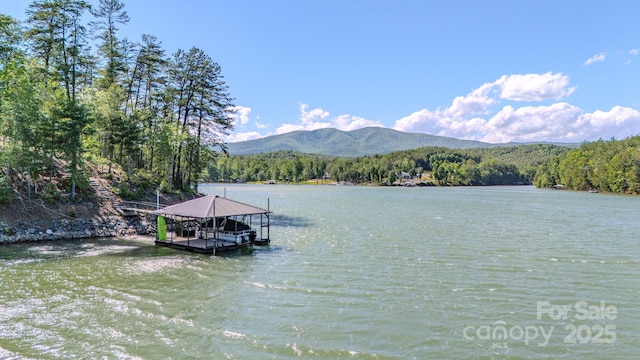 223 Linville View Dr, Nebo, NC 28761 - dock area featuring a wooded view and a water and mountain view
