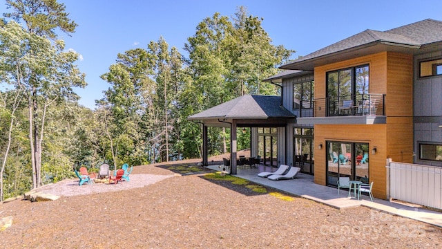 223 Linville View Dr, Nebo, NC 28761 - view of yard featuring a fire pit, a patio, and a balcony