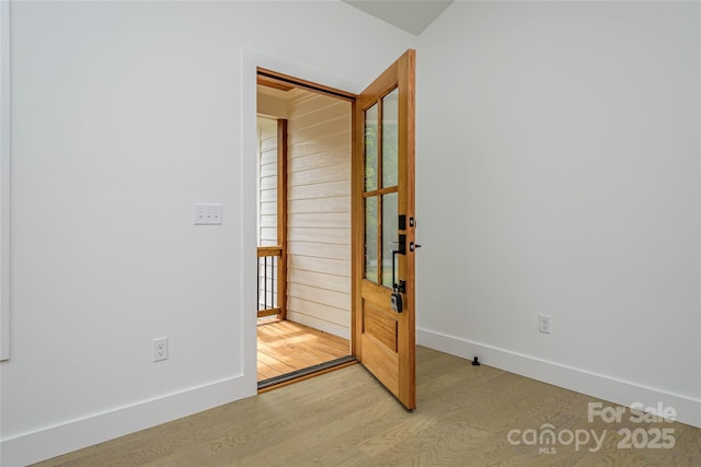 118 W Laurel Ln, Etowah, NC 28729 - spare room featuring light wood-style floors and baseboards