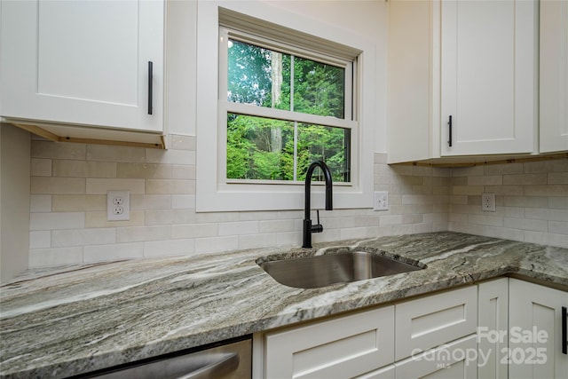 118 W Laurel Ln, Etowah, NC 28729 - kitchen with white cabinets, light stone countertops, tasteful backsplash, and dishwasher