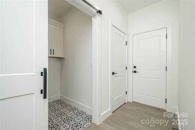 118 W Laurel Ln, Etowah, NC 28729 - laundry room featuring baseboards