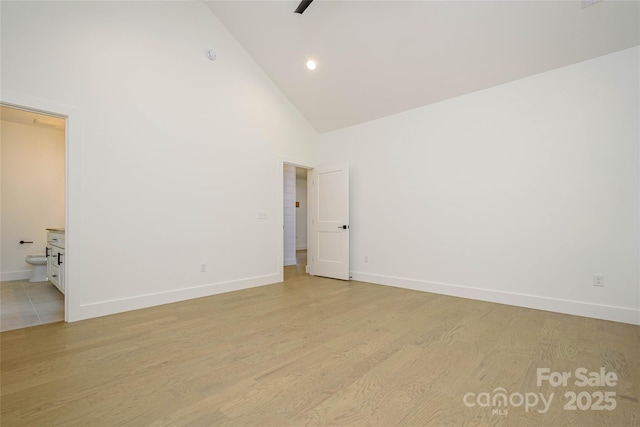 118 W Laurel Ln, Etowah, NC 28729 - empty room featuring high vaulted ceiling, light wood-style floors, and recessed lighting