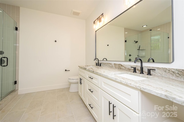 118 W Laurel Ln, Etowah, NC 28729 - bathroom with double vanity, tile patterned floors, and a shower stall