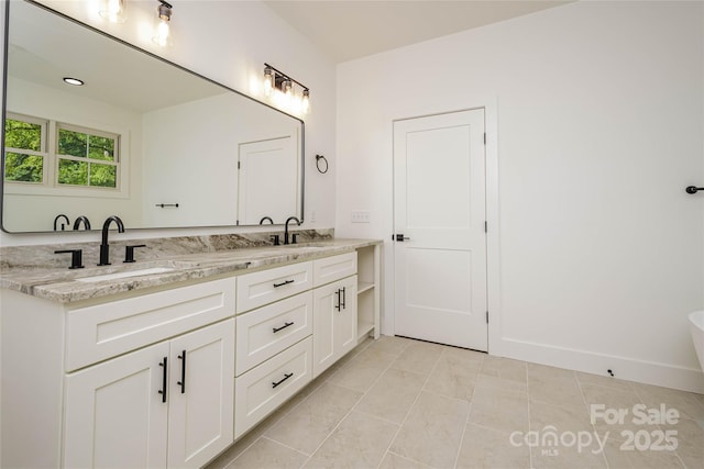 118 W Laurel Ln, Etowah, NC 28729 - full bath featuring double vanity and a freestanding bath