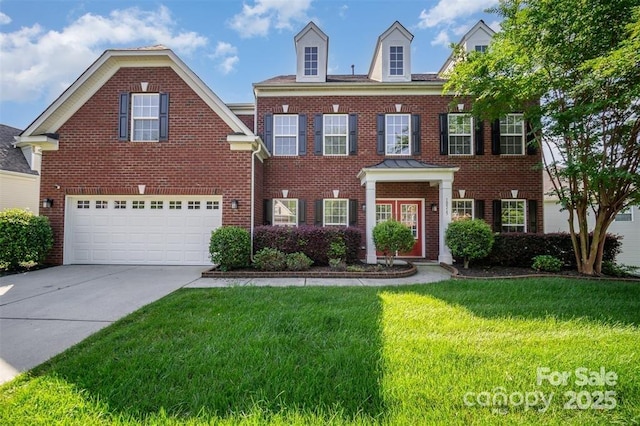 10515 Greenhead View Rd, Charlotte, NC 28262 - colonial home with brick siding, a front lawn, concrete driveway, and a garage