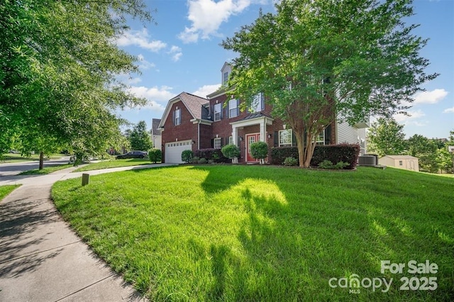 10515 Greenhead View Rd, Charlotte, NC 28262 - view of front facade with a garage, brick siding, driveway, and a front yard