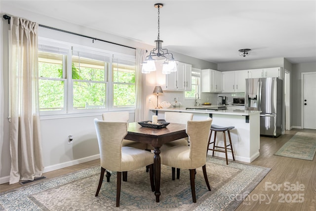 16 Royal Rdg, Clyde, NC 28721 - dining room featuring baseboards and light wood-type flooring