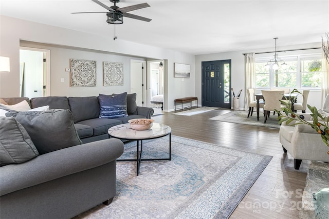 16 Royal Rdg, Clyde, NC 28721 - living room featuring ceiling fan, wood finished floors, and baseboards