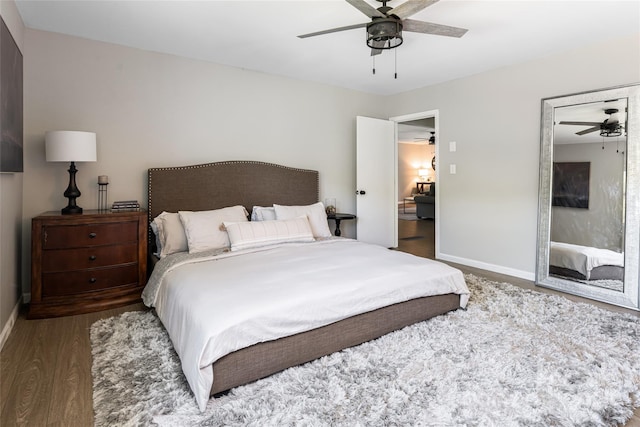 16 Royal Rdg, Clyde, NC 28721 - bedroom featuring baseboards, wood finished floors, and a ceiling fan