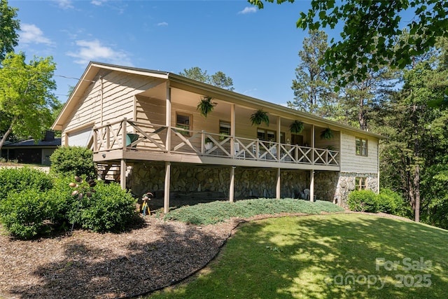 16 Royal Rdg, Clyde, NC 28721 - back of house featuring stone siding and a yard