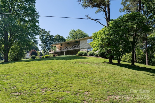16 Royal Rdg, Clyde, NC 28721 - view of green lawn with a wooden deck