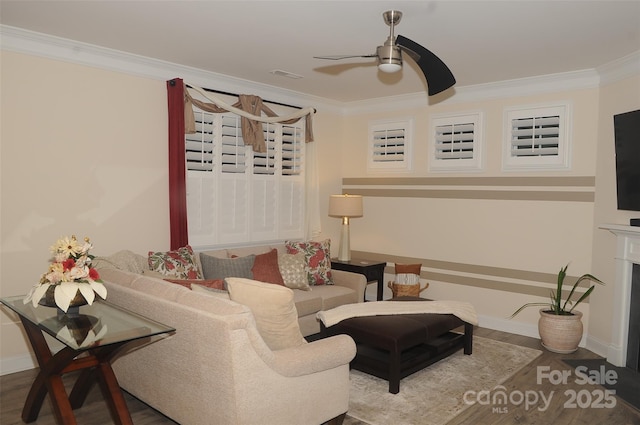 813 Latrobe Dr Unit 365, Iron Station, NC 28080 - living area with crown molding, a ceiling fan, wood finished floors, and baseboards