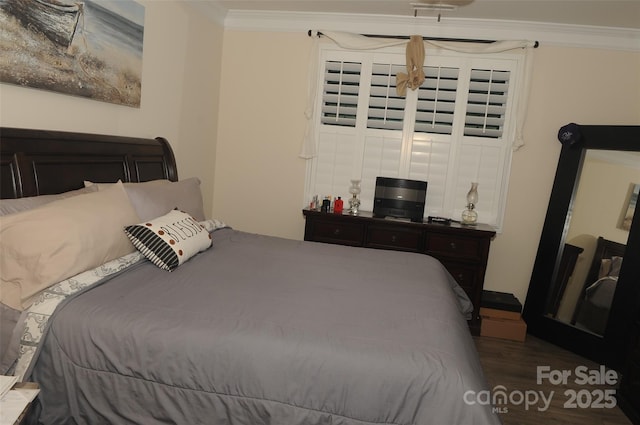 813 Latrobe Dr Unit 365, Iron Station, NC 28080 - bedroom featuring ornamental molding and wood finished floors