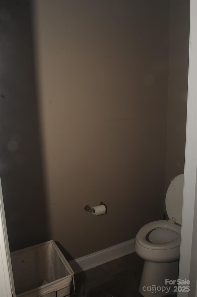 813 Latrobe Dr Unit 365, Iron Station, NC 28080 - bathroom with toilet, baseboards, and tile patterned flooring