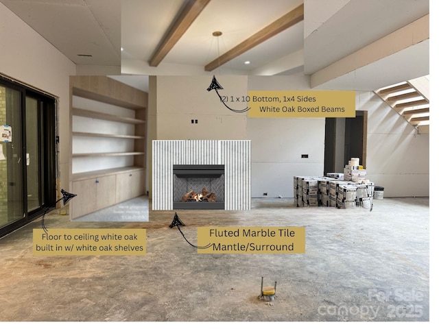 5427 Addison Dr, Charlotte, NC 28211 - living room featuring beamed ceiling, a warm lit fireplace, built in shelves, and concrete floors