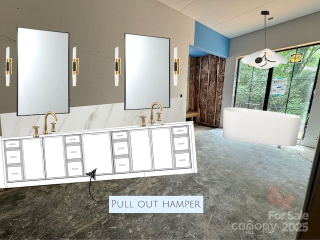 5427 Addison Dr, Charlotte, NC 28211 - bathroom with double vanity and a freestanding tub