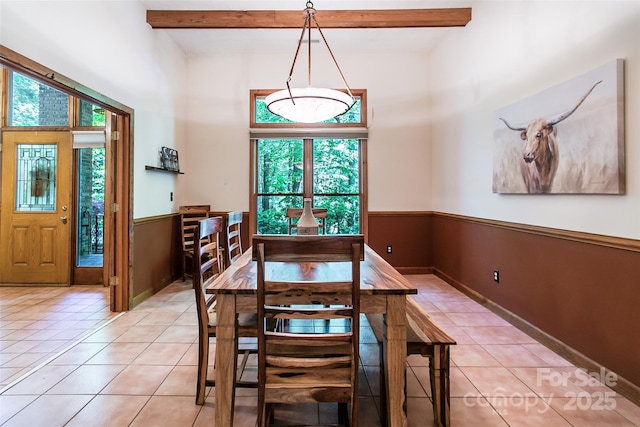 200 Maple Hill Dr, Flat Rock, NC 28731 - dining space with light tile patterned floors, wainscoting, beamed ceiling, and a towering ceiling