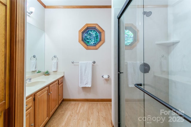 200 Maple Hill Dr, Flat Rock, NC 28731 - full bath featuring wood finished floors, vanity, a shower with door, and crown molding