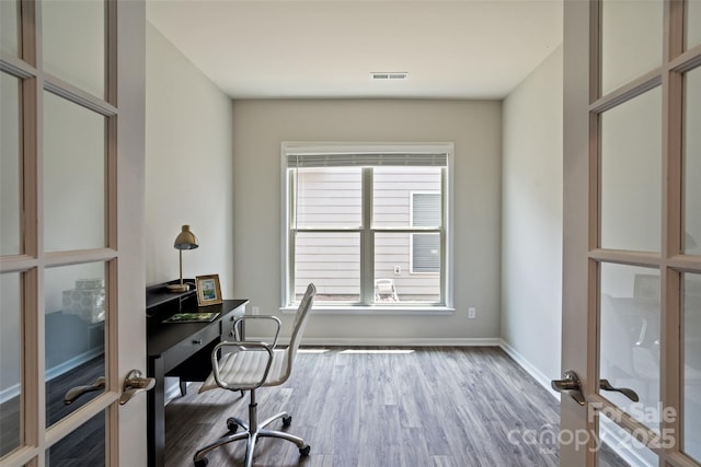 2329 Delaney Dr, Fort Mill, SC 29715 - office area featuring french doors, wood finished floors, and baseboards